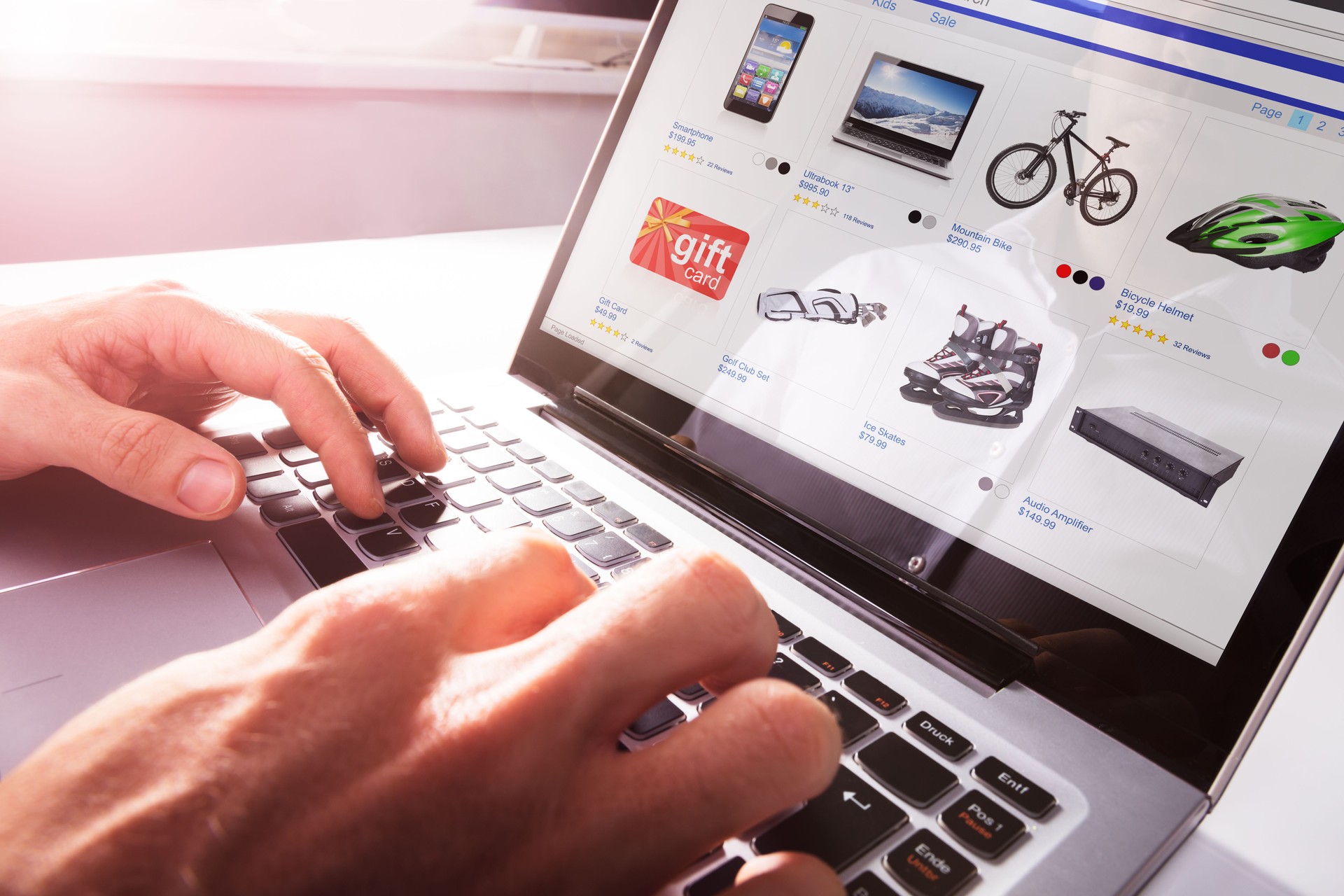 Person Shopping Online On Laptop