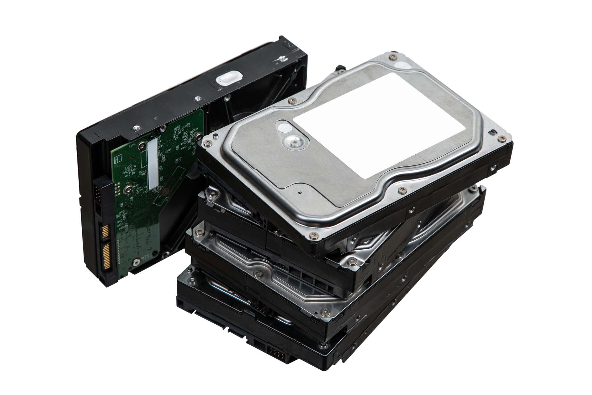 Hard drives stacked on top of each other. SATA 3.5 HDD for information storage. Isolate on a white background.